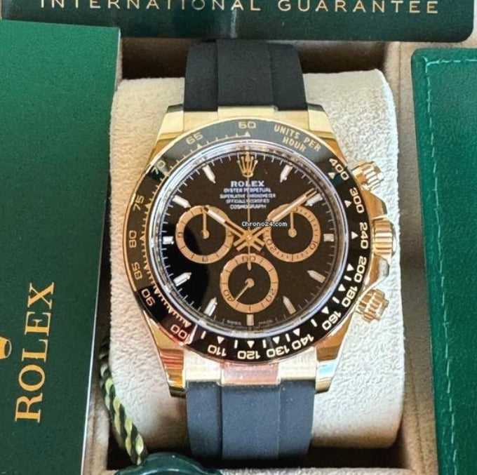 Cosmograph Daytona Yellow Gold Ceramic Bezel Black Dial